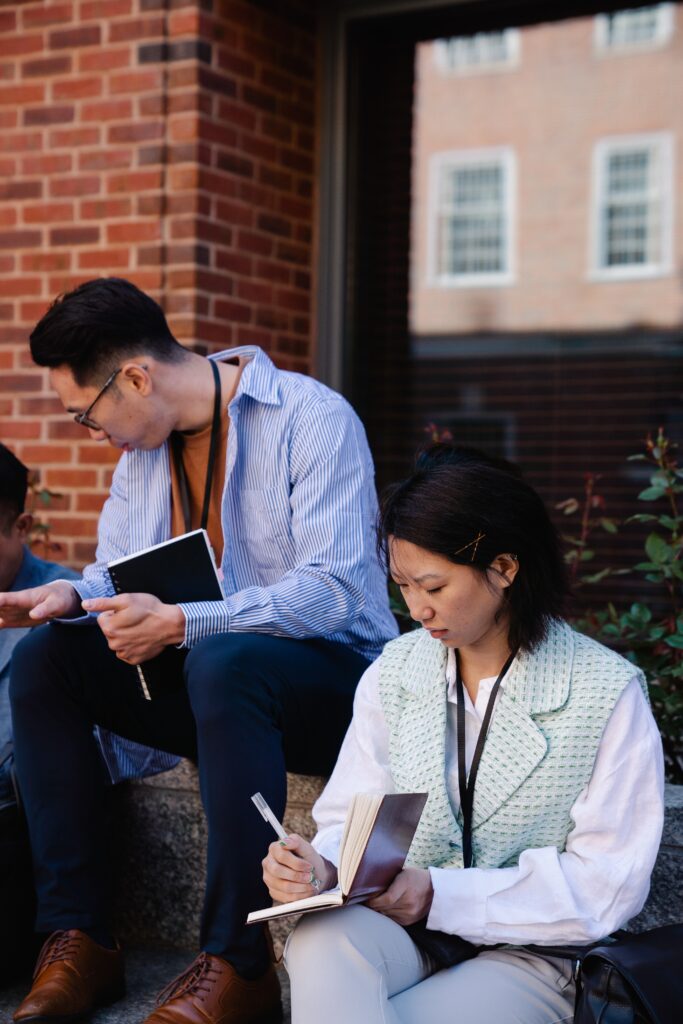 Students sitting on a campus studying