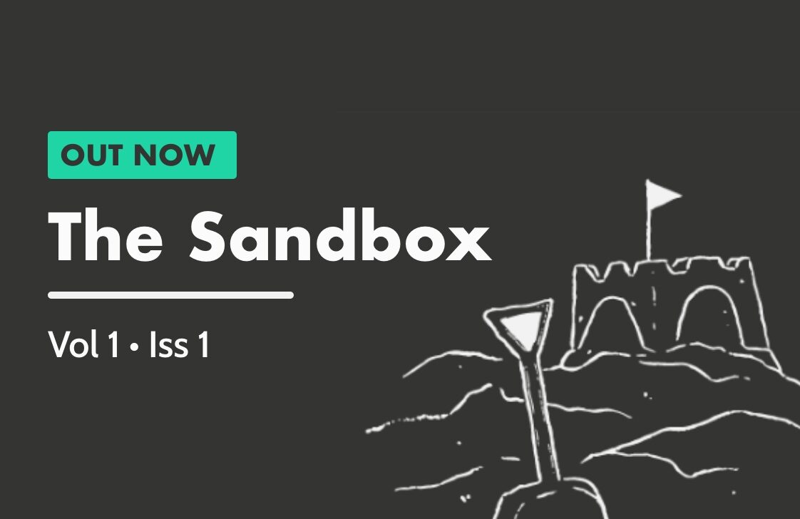 A handdrawn sandcastle on a black background with the words "Out Now | The Sandbox | Vol 1 • Iss 1"